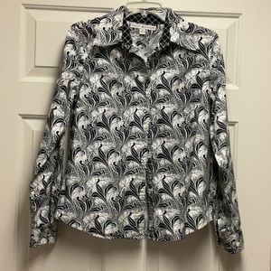 Black and white blouse with snap buttons size 10. Very cute pattern, like new!